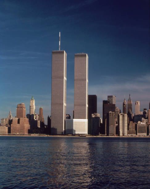 the-twin-towers-of-the-world-trade-center-in-new-york-city-as-seen-from-the-hudson-river-circa.jpg