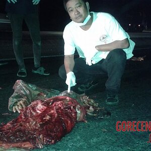 Thai-dude-run-over-by-multiple-vehicles-8.jpg